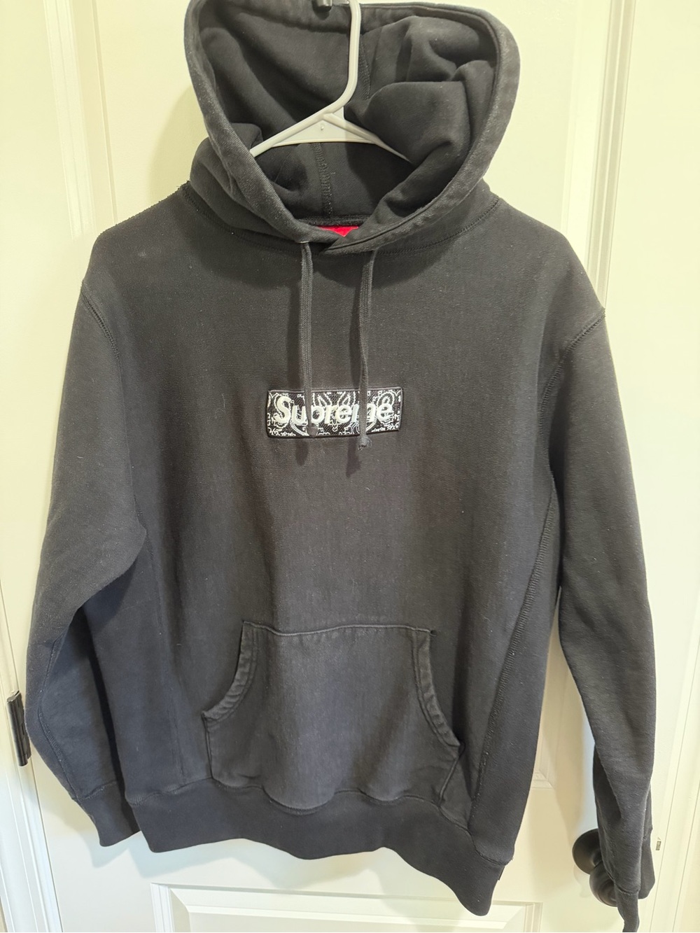 Supreme Black Pullover Hoodie with Monochrome Logo Patch